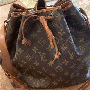 Louis Vuitton tie string bag in good condition. Petite noe.